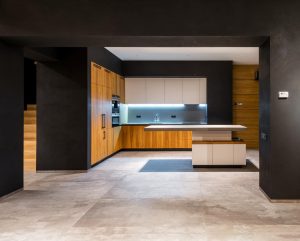 spacious dark kitchen with kitchen worktops